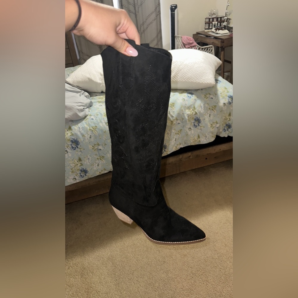 Black knee high boot